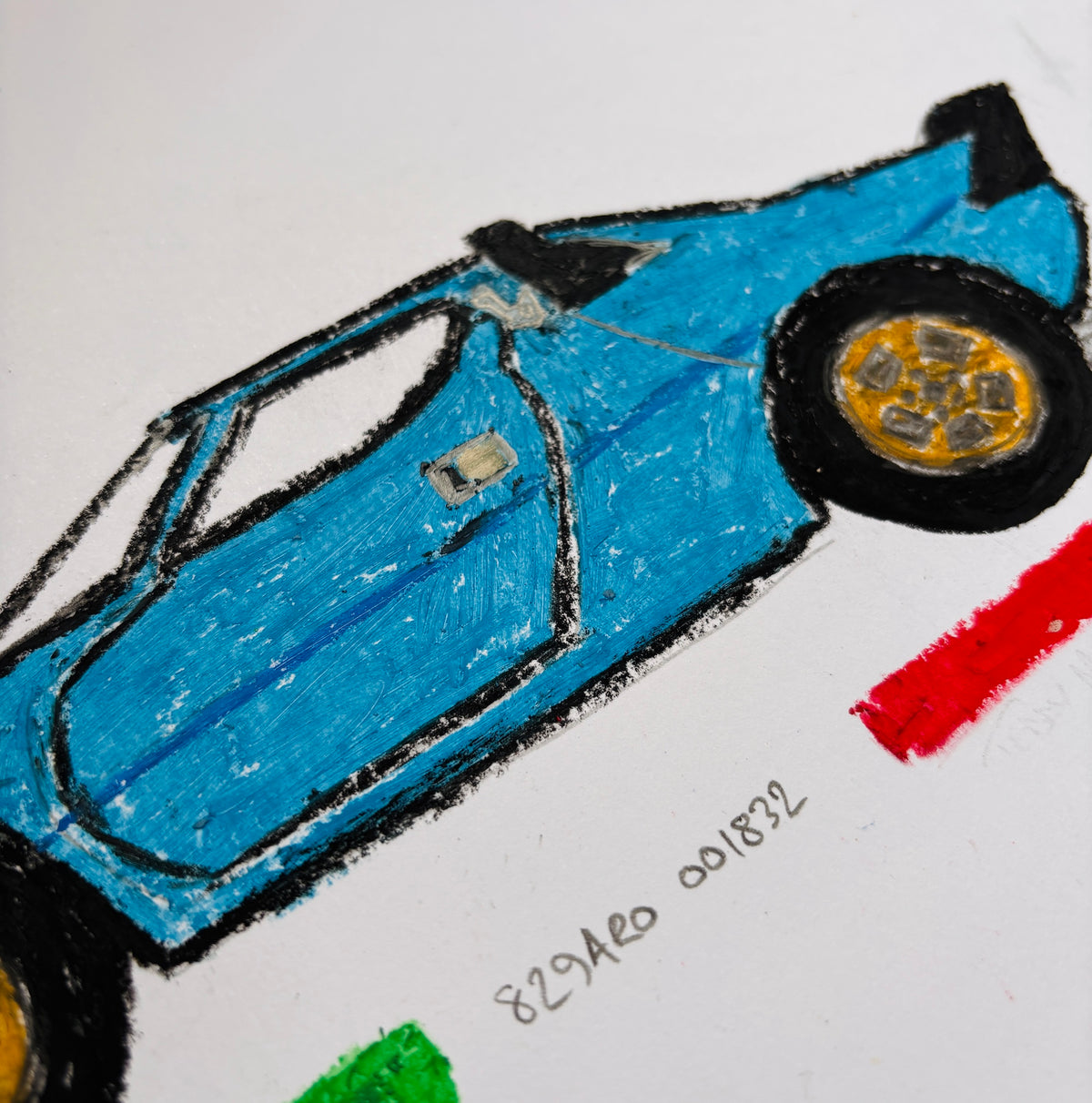 A close-up of a hand-drawn azzurro Lancia Stratos on white paper, with black outlines, gold wheels, and small red and green color tricolore.