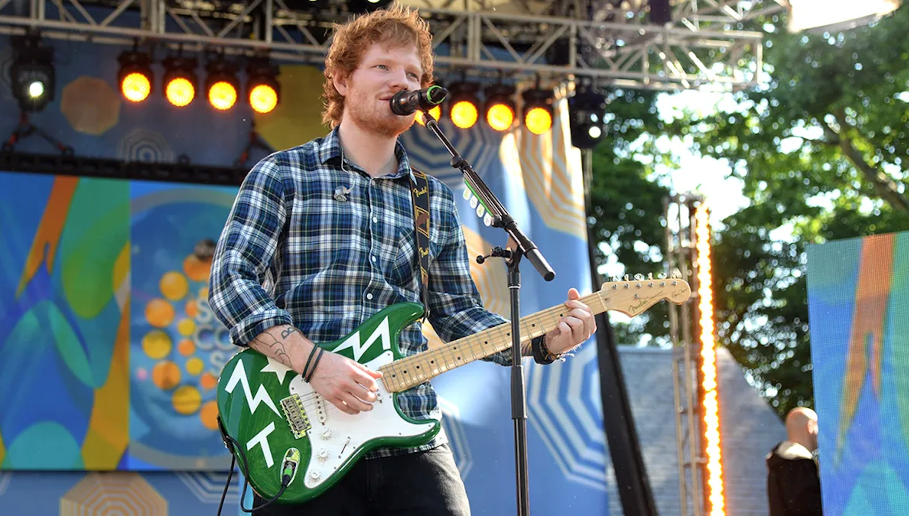 ed sheeran playing a bespoke guitar designed by teddy McDonald fender Stratocaster known as Green T