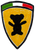 Shield-shaped logo with a black bear silhouette on a yellow background, flanked by Italian flag belongs to Teddy McDonald artisan and maker.